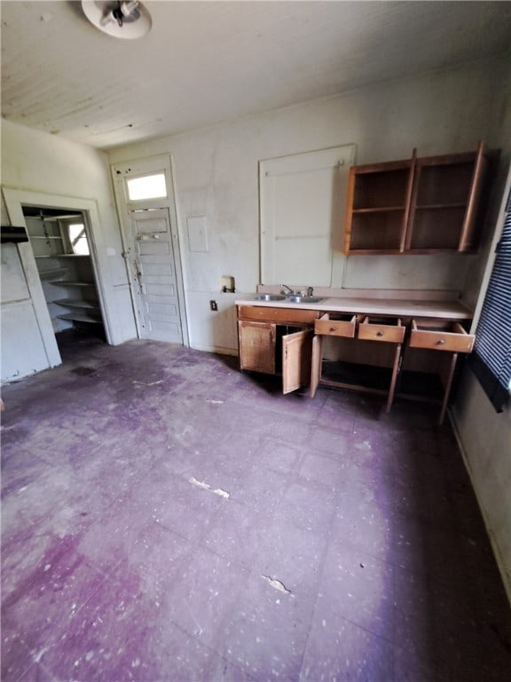 interior space featuring a sink and tile patterned floors