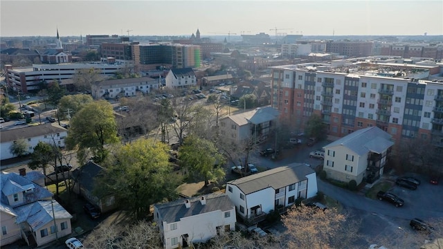 birds eye view of property featuring a view of city