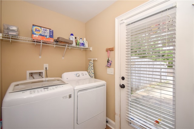 laundry room with independent washer and dryer