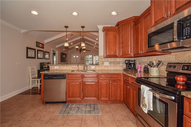 kitchen featuring sink, stainless steel appliances, ornamental molding, decorative light fixtures, and kitchen peninsula