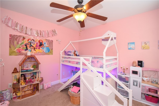 carpeted bedroom featuring ceiling fan