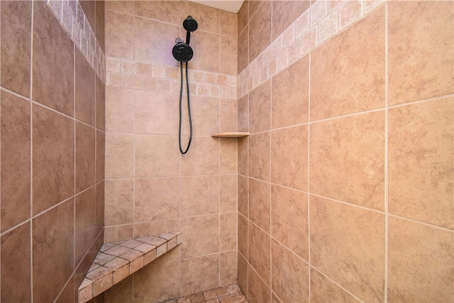 details featuring a tile shower