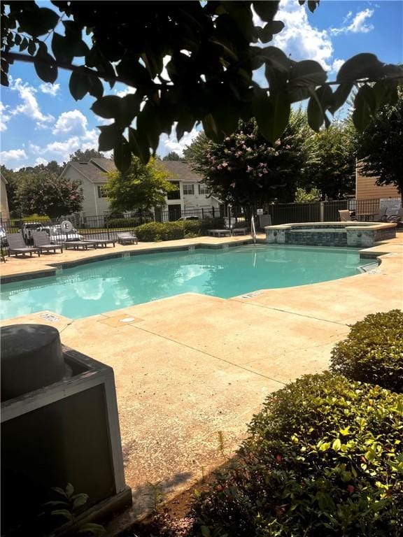 447 W Longleaf Dr Unit 101, Auburn, AL 36832 - community pool featuring a fenced backyard, a patio, and an outdoor hot tub