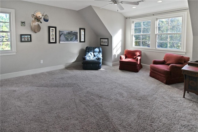 sitting room with carpet, ceiling fan, and vaulted ceiling