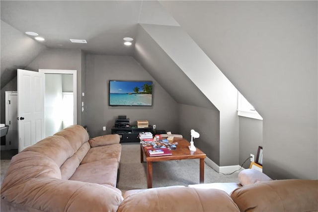 living room with light colored carpet and lofted ceiling