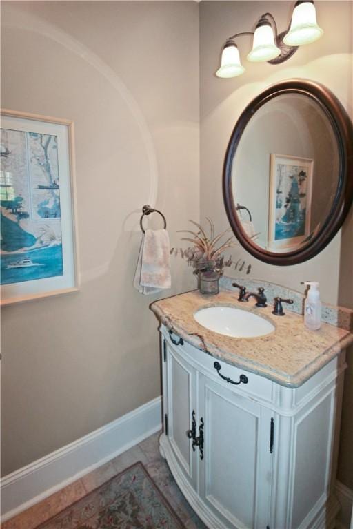 bathroom featuring tile patterned floors and vanity