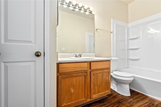 447 W Longleaf Dr Unit 1007, Auburn, AL 36832 - full bathroom featuring vanity, wood finished floors, toilet, and bathtub / shower combination