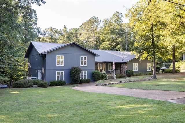 view of front of home with a front lawn and a porch