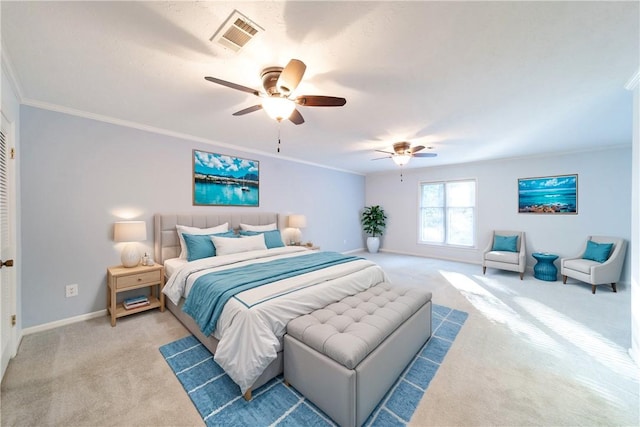 bedroom featuring carpet flooring, ceiling fan, and crown molding