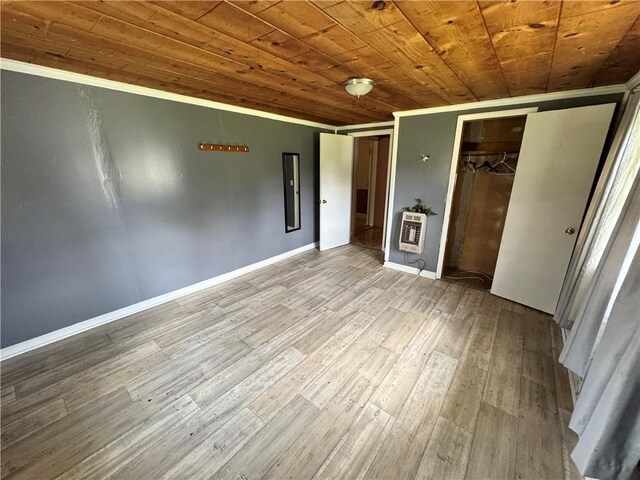4380 County Road 62, Lafayette, AL 36862 - unfurnished bedroom featuring heating unit, wood ceiling, baseboards, and wood finished floors