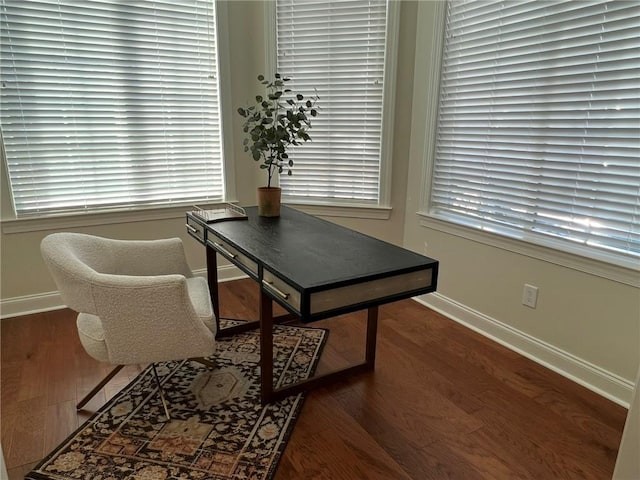 office featuring wood finished floors and baseboards