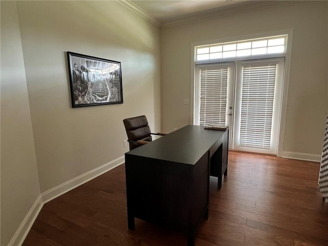 office area with crown molding, dark wood-type flooring, and baseboards