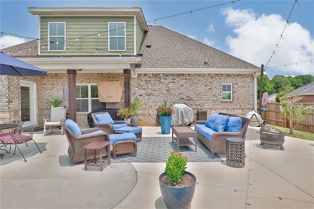 914 E Towne Lake Cir, Opelika, AL 36804 - view of patio featuring an outdoor living space with a fire pit