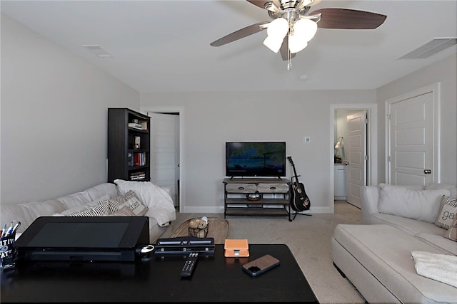 914 E Towne Lake Cir, Opelika, AL 36804 - living area featuring ceiling fan, light carpet, and baseboards