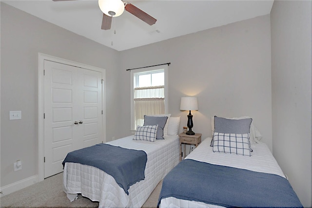 914 E Towne Lake Cir, Opelika, AL 36804 - bedroom with carpet flooring, baseboards, ceiling fan, and a closet