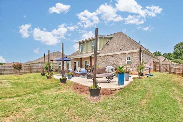 914 E Towne Lake Cir, Opelika, AL 36804 - rear view of house with a patio area, an outdoor living space, brick siding, a gazebo, and a shingled roof