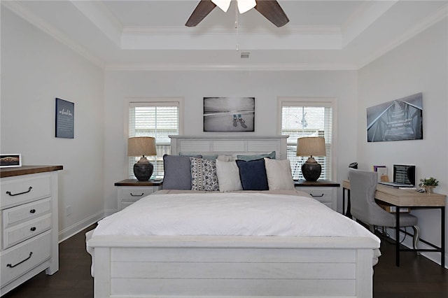 914 E Towne Lake Cir, Opelika, AL 36804 - bedroom featuring a tray ceiling, multiple windows, dark wood finished floors, and ornamental molding