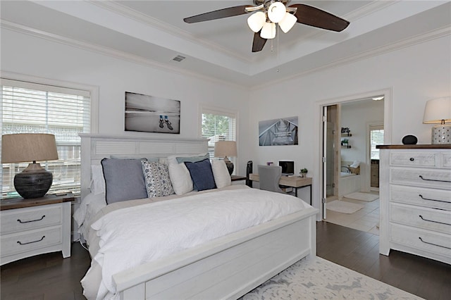 914 E Towne Lake Cir, Opelika, AL 36804 - bedroom with multiple windows, ornamental molding, dark wood-type flooring, a raised ceiling, and ceiling fan