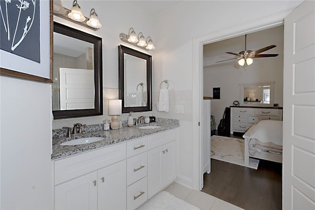 914 E Towne Lake Cir, Opelika, AL 36804 - ensuite bathroom featuring double vanity, ceiling fan, and wood finished floors