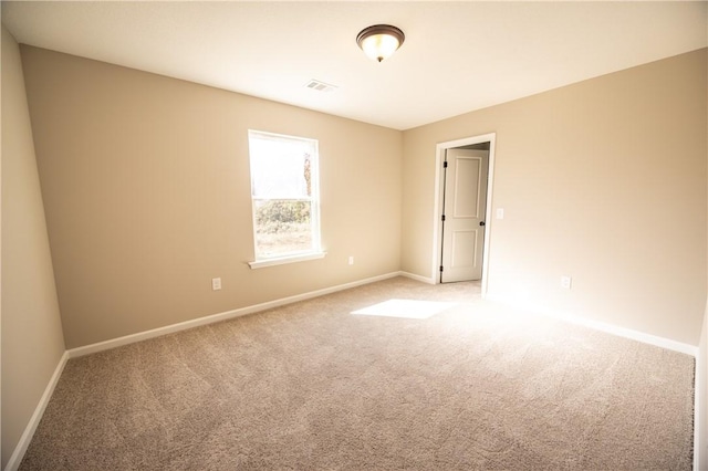 view of carpeted spare room