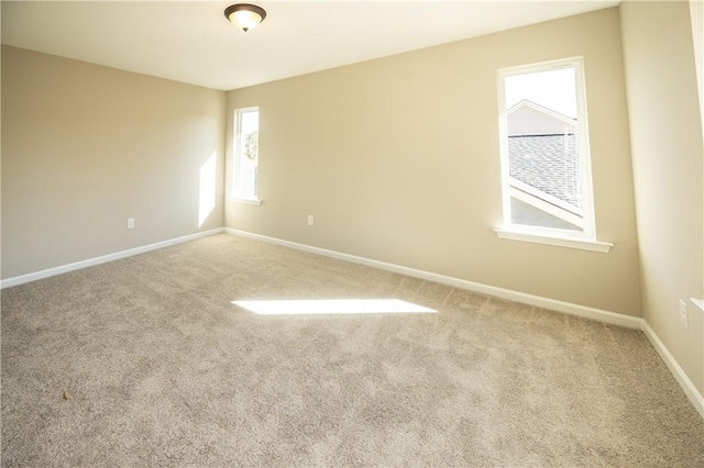 view of carpeted spare room