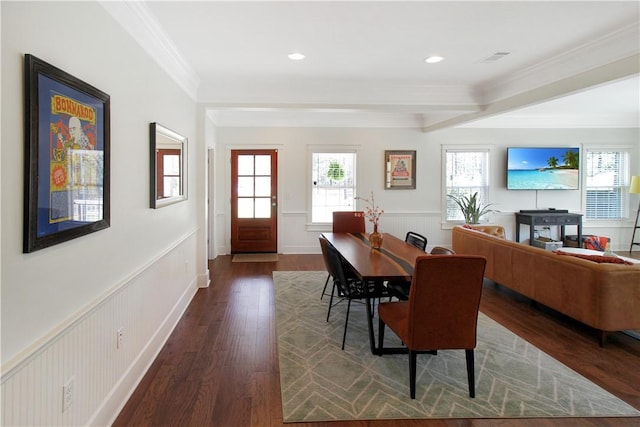dining area featuring a wainscoted wall, recessed lighting, dark wood-style floors, and crown molding