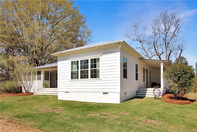exterior space featuring a front yard and crawl space