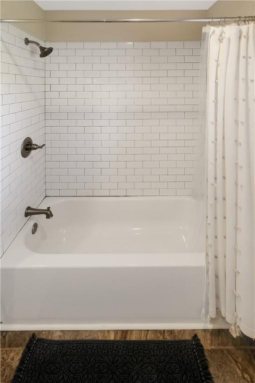 full bathroom with shower / bathtub combination with curtain