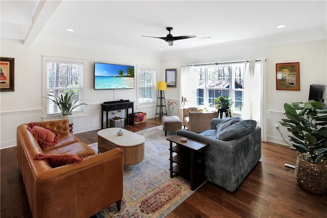living room featuring wood finished floors, recessed lighting, ceiling fan, and wainscoting