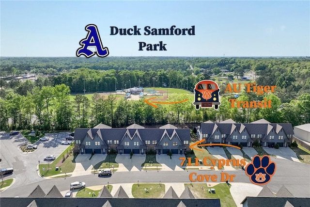 aerial view featuring a wooded view
