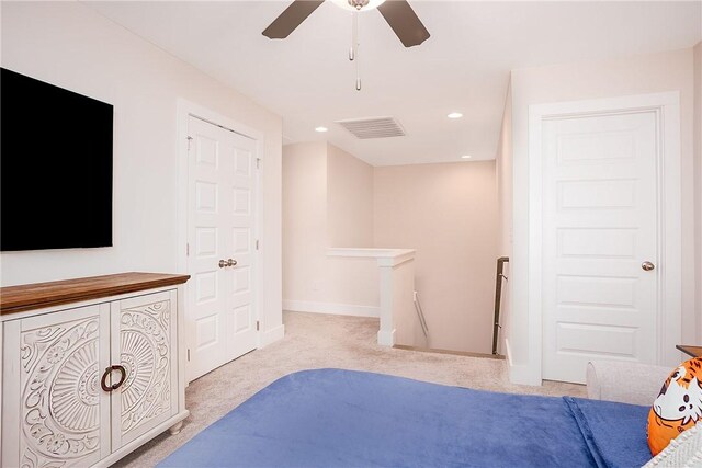 home office featuring ceiling fan, baseboards, carpet floors, and visible vents
