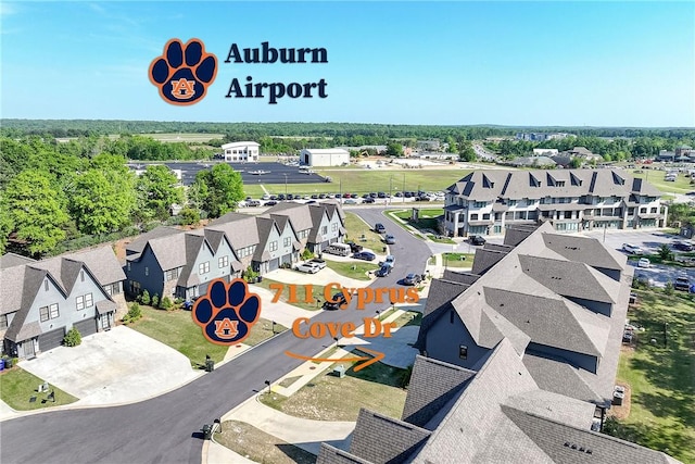 birds eye view of property with a residential view
