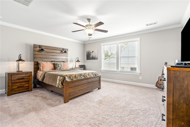 carpeted bedroom featuring crown molding, visible vents, and baseboards