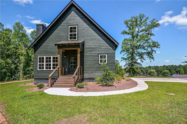 325 Whisper Trce, Tallassee, AL 36078 - view of front of house with a chimney and a front yard