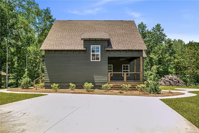 325 Whisper Trce, Tallassee, AL 36078 - view of side of property with a shingled roof and a ceiling fan