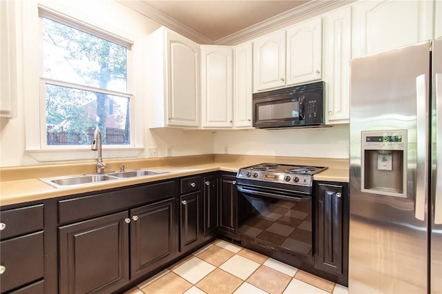 kitchen with black appliances, white cabinets, crown molding, and sink