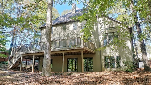 rear view of property with a deck