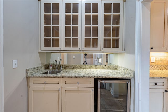 1761 Woodley Rd, Auburn, AL 36830 - indoor wet bar featuring wine cooler and backsplash