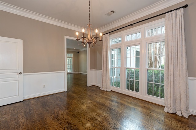 1761 Woodley Rd, Auburn, AL 36830 - unfurnished dining area featuring a chandelier, crown molding, a wainscoted wall, and dark wood-type flooring