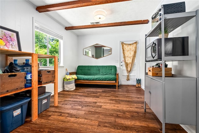 333 Tullahoma Dr, Auburn, AL 36830 - living area featuring beam ceiling, wood finished floors, and baseboards