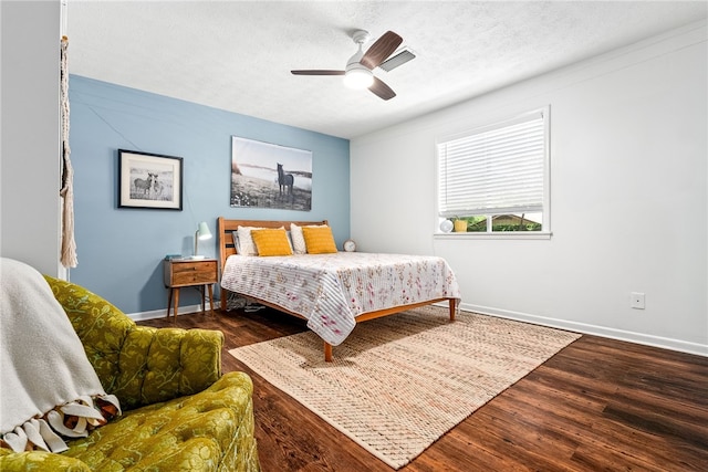 333 Tullahoma Dr, Auburn, AL 36830 - bedroom featuring wood finished floors, baseboards, a textured ceiling, and a ceiling fan