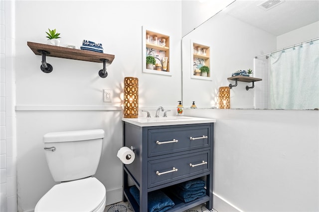 333 Tullahoma Dr, Auburn, AL 36830 - bathroom with vanity, toilet, and a shower with curtain