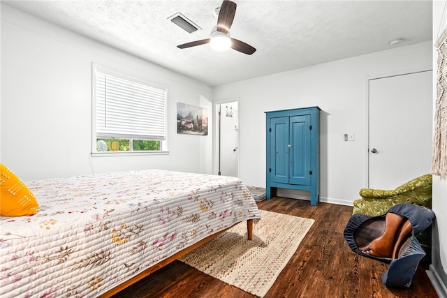 333 Tullahoma Dr, Auburn, AL 36830 - bedroom with wood finished floors, a textured ceiling, and ceiling fan
