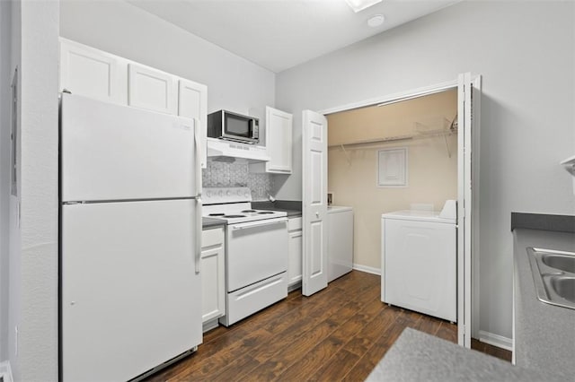 kitchen with white appliances, dark wood-type flooring, white cabinetry, separate washer and dryer, and decorative backsplash