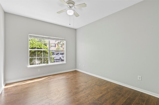 empty room with wood-type flooring and ceiling fan