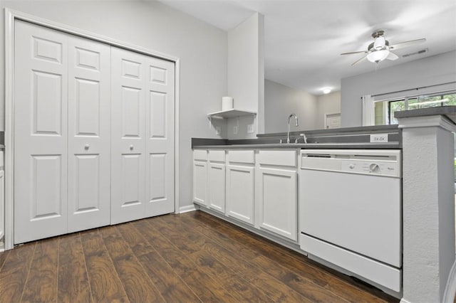 kitchen featuring dark wood-type flooring, sink, white cabinetry, dishwasher, and ceiling fan