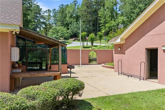 1115 Willow Run, Opelika, AL 36801 - view of patio / terrace with a gate and a sunroom