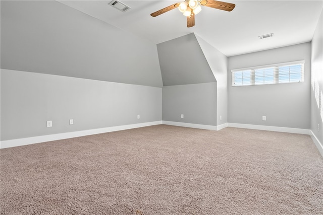 bonus room featuring ceiling fan, lofted ceiling, and carpet floors