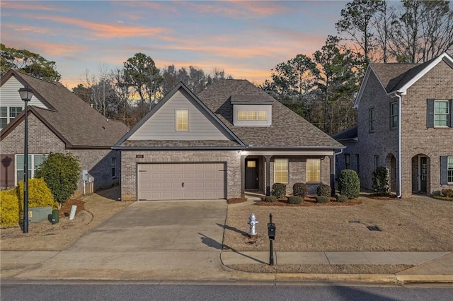 front of property with a garage