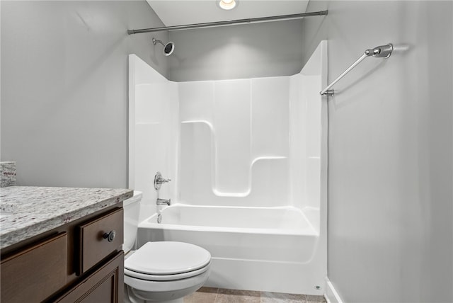 full bathroom featuring vanity,  shower combination, and toilet